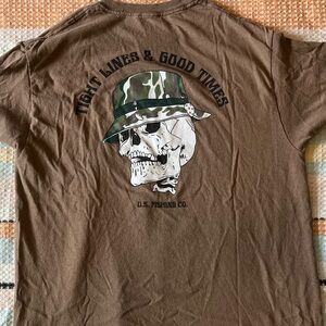 Men's fit medium tan shirt. Graphics on both sides